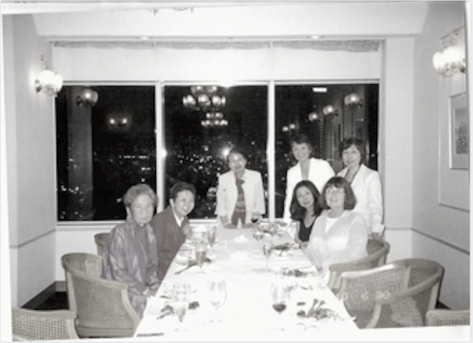 Conference Table with memebers seated around